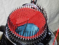 Circular Sock Machines use a Heel Hook, Heel Grip to Hold the Stitches down when Knitting the heel of a sock